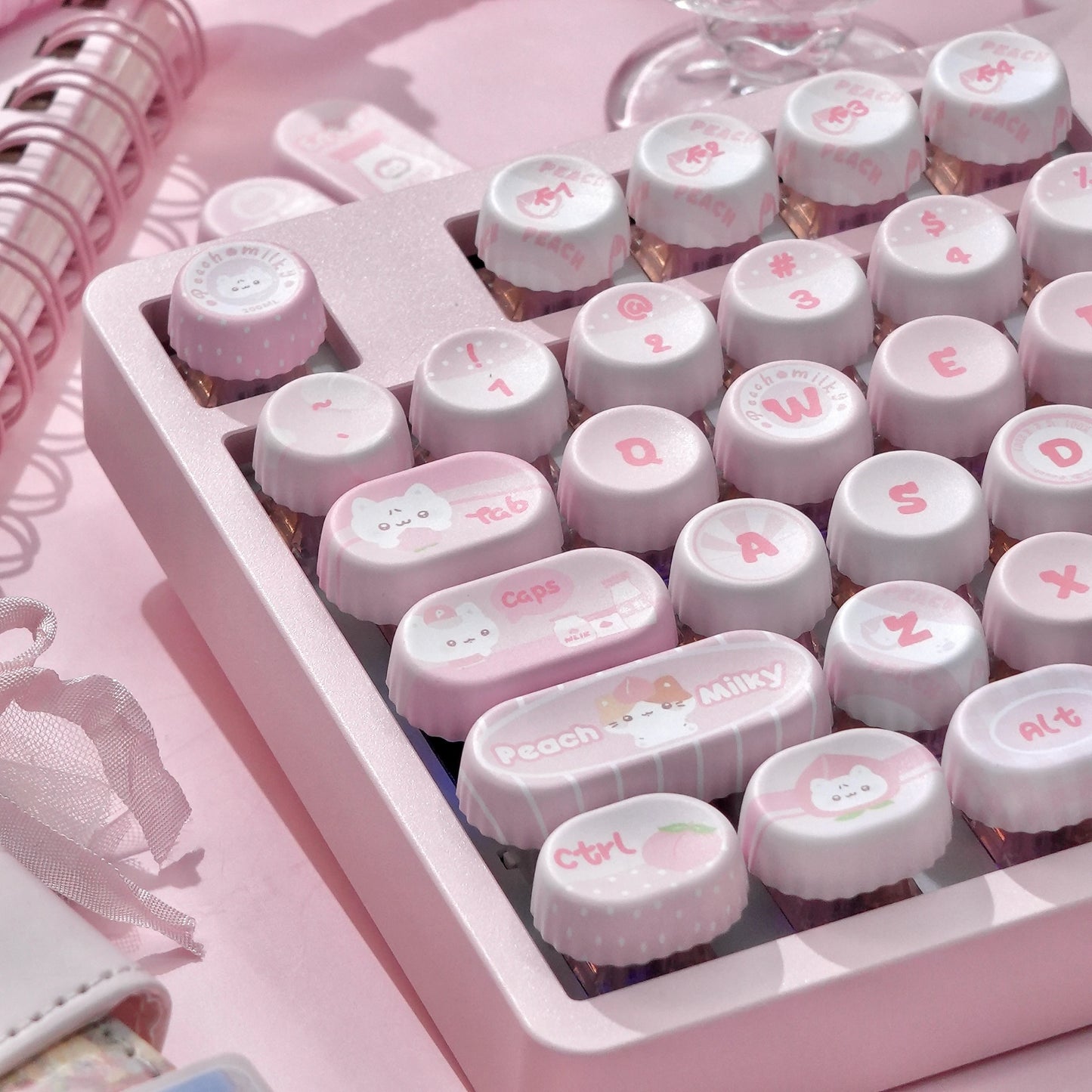 Side view of pink pastel NOG profile PBT keycaps with kawaii theme