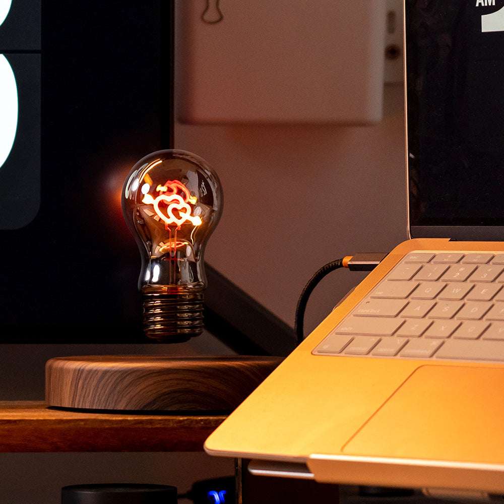 Heart-shaped LED bulb used in bedroom or gift setup