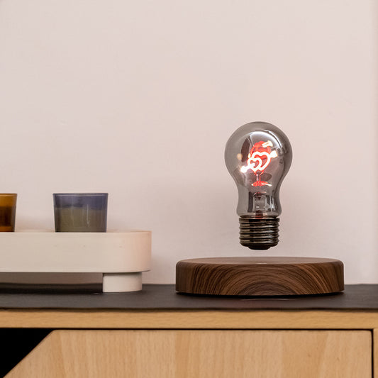 Floating heart lamp using magnetic levitation on desk