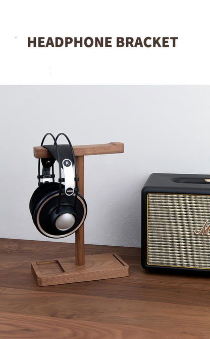 Desk setup with black walnut headphone stand and accessories