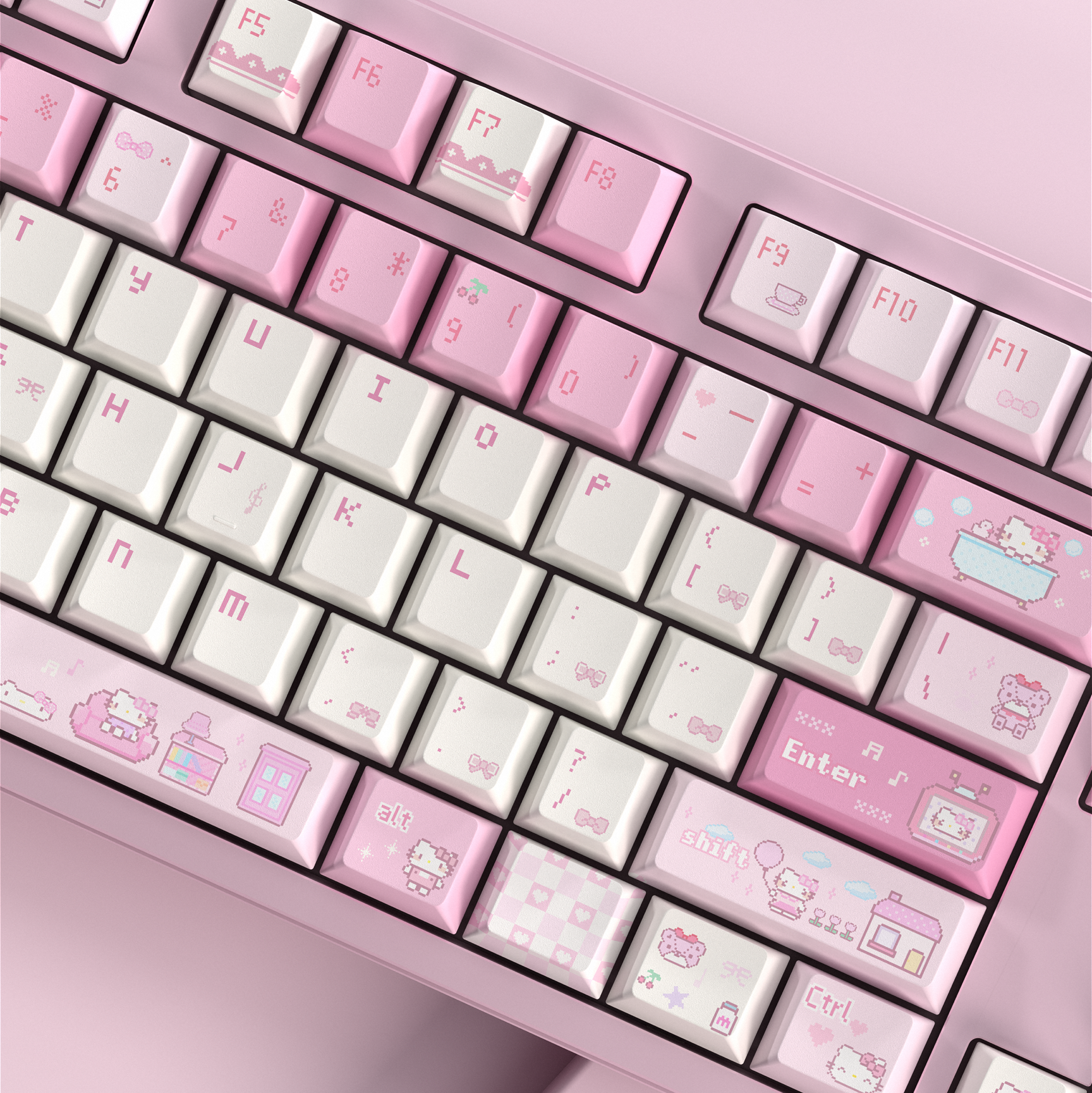 A close-up of a pastel pink mechanical keyboard with cute Hello Kitty themed keycaps, set against a matching pink background.