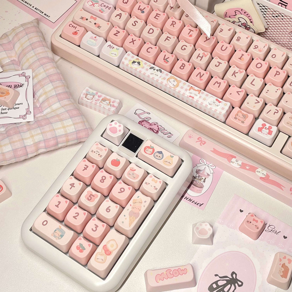 140-key PBT keycaps with kawaii cat paw and ribbon designs