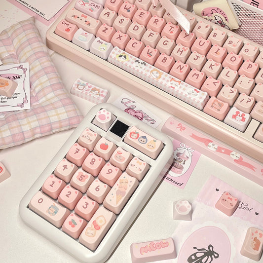 140-key PBT keycaps with kawaii cat paw and ribbon designs