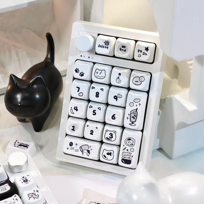 Cute line art cat keycaps in MAO profile with pastel color scheme