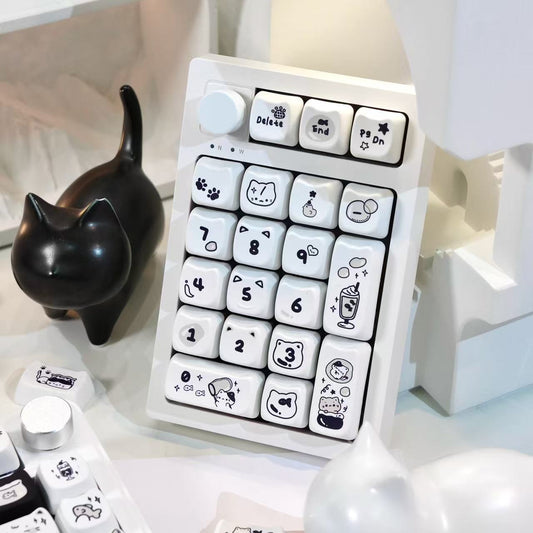 Cute line art cat keycaps in MAO profile with pastel color scheme