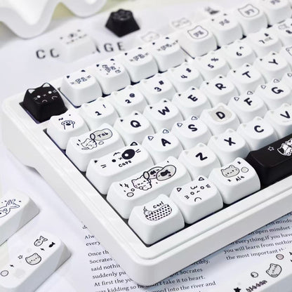 PBT dye-sublimated keycaps with minimalist cat illustrations