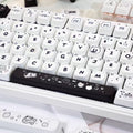 Full set of 140 MAO profile cat-themed keycaps on mechanical keyboard