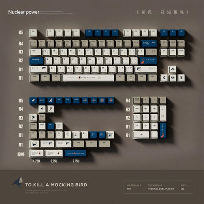 "To Kill a Mockingbird keycap set with side-engraved legends in cream and navy blue, 130-key layout shown."
