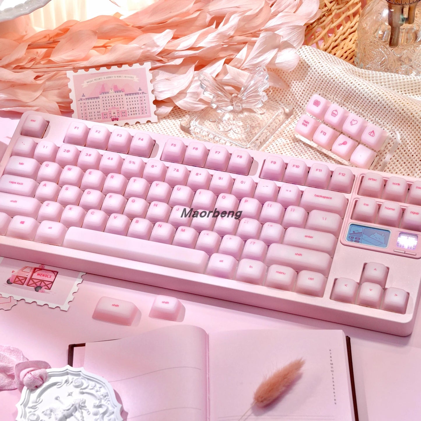 Mechanical keyboard with soft silicone keycaps installed, glowing with RGB lights