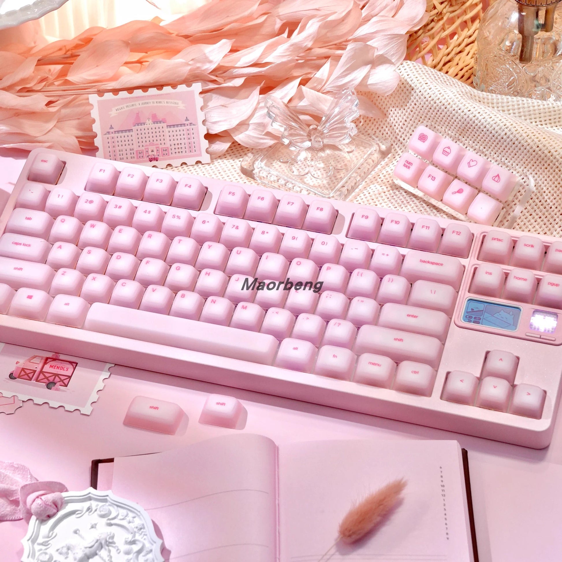 Mechanical keyboard with soft silicone keycaps installed, glowing with RGB lights