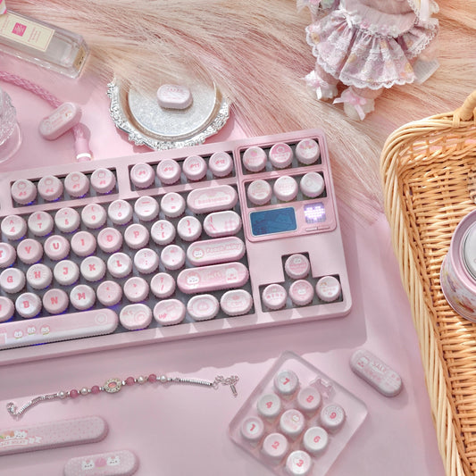Close-up of five-side dye-sublimated legends on White Peach Milk keycaps