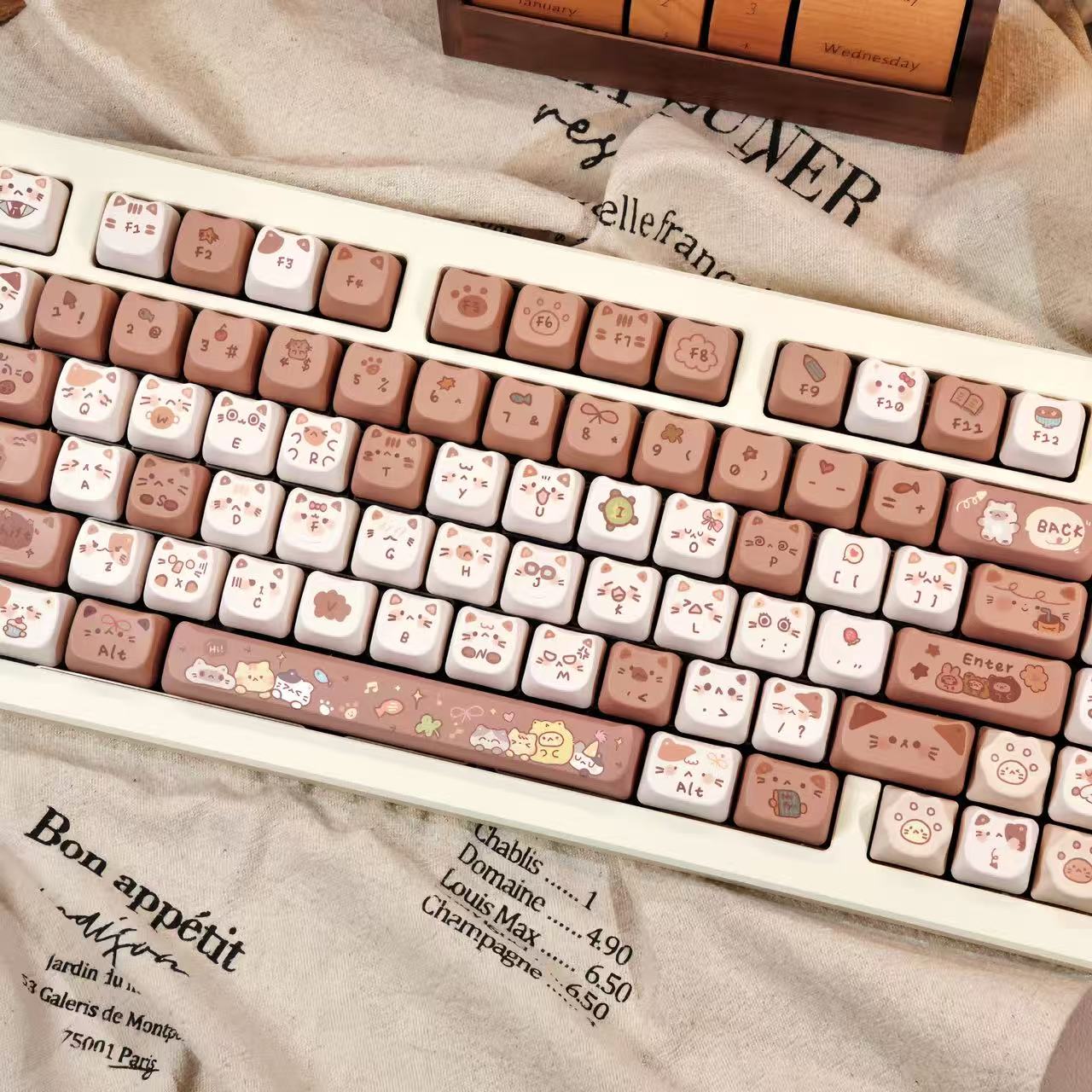 cute cat themed keycaps in brown and cream