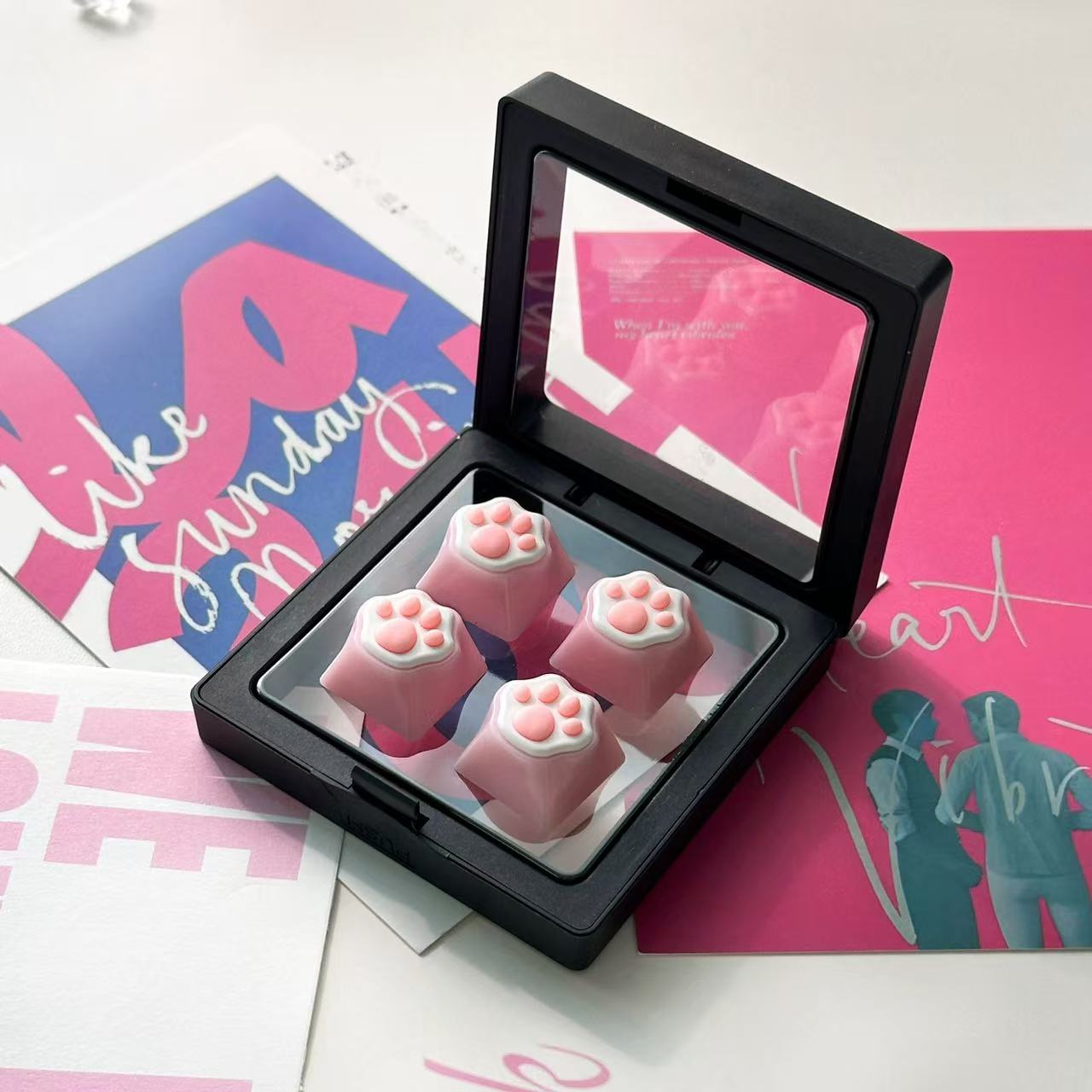 milky translucent pink cat paw keycaps