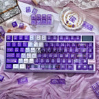 Purple pastel custom keycaps with clear PC housings for aesthetic desk setup
