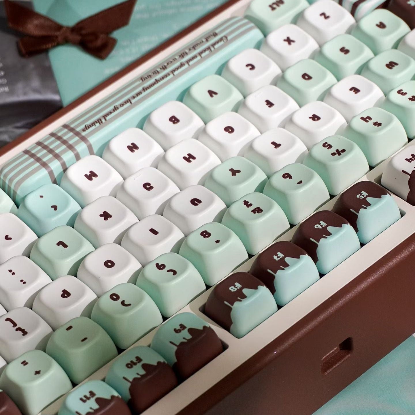 Keyboard with cute face keys on a light blue background