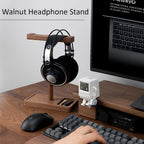 Desk setup with black walnut headphone stand and accessories