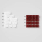 White and red square tiles with measurement labels on a light gray background