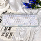 Clear mechanical keyboard on a white fabric background with flowers and text.