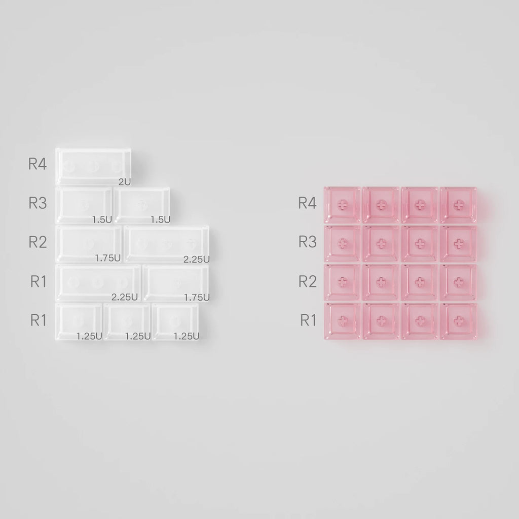Comparison of white and pink silicone molds on a gray background