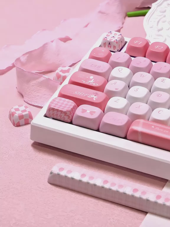 Side view of MOA Profile Tulip 140-key pastel pink and white keycap set on a white mechanical keyboard